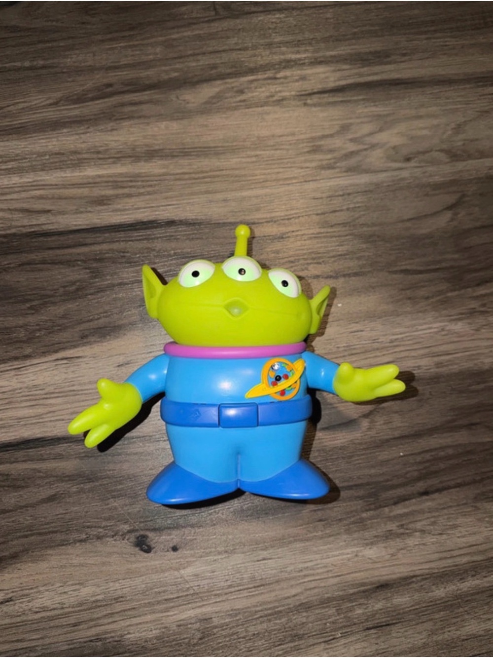 Disney Green Three-Eyed Alien Figure with Blue Outfit and Pink Collar